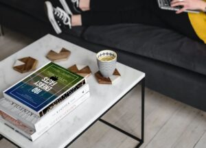 100 Renewable Energy Content Marketing Stats & Facts | coffee table with books | A.R. Marketing House